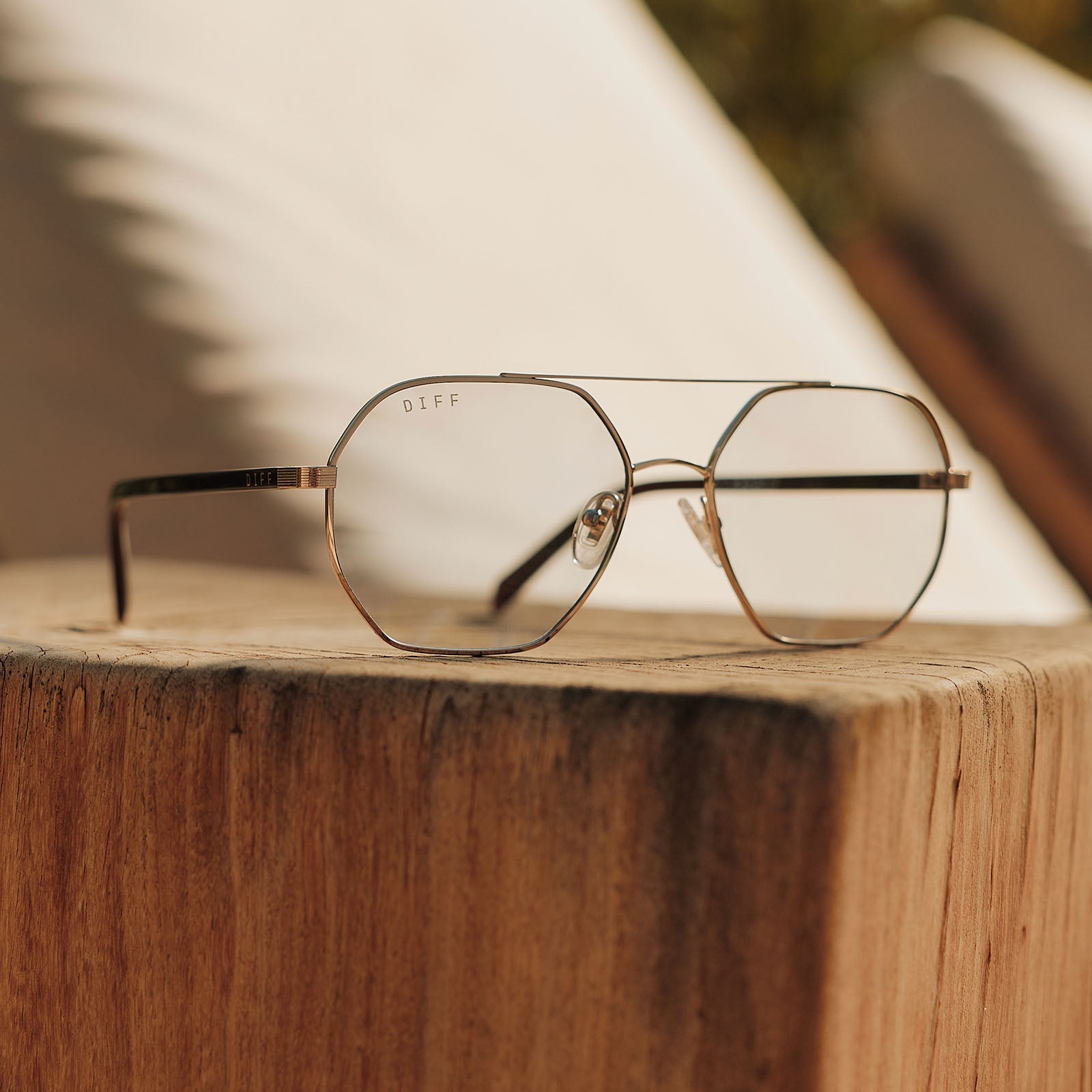 Joelle Sunglasses — Gold + Chocolate Crystal + Grey Tint