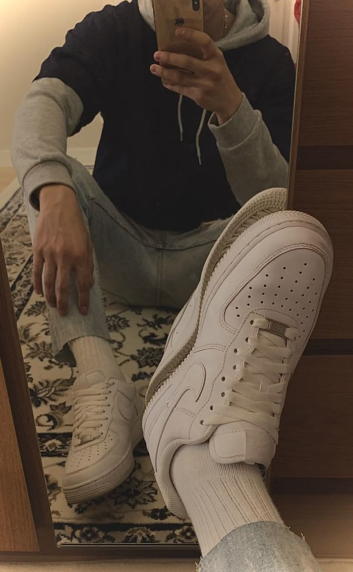 K.